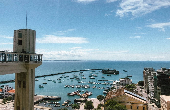 the historic elevator stands above Todos-os-Santos Bay and offers a striking perspective over the waterfront, the Mercado Modelo, and the Forte de São Marcelo.